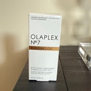 OLAPLEX No.7 Bonding Oil with White and Gold Packaging